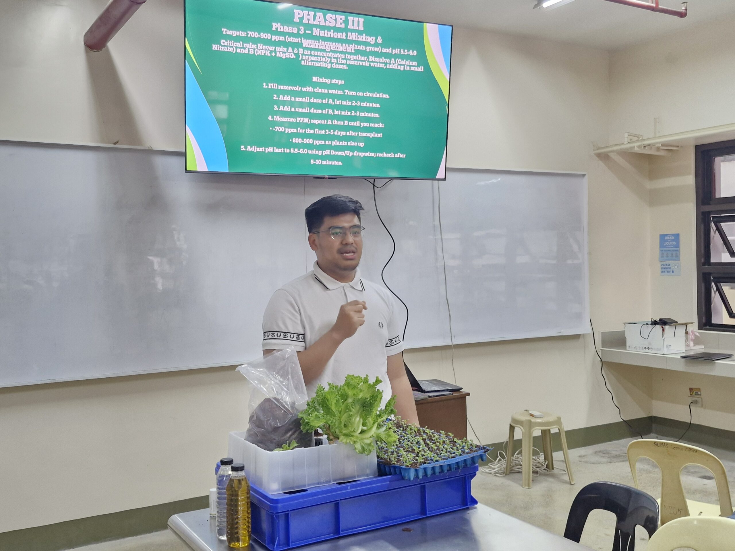 Mr. Sison explaining the functions of the materials used in hydroponics.