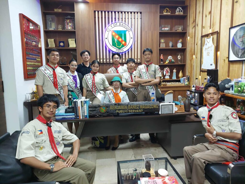 Scout officials for a day posing for a photo op.