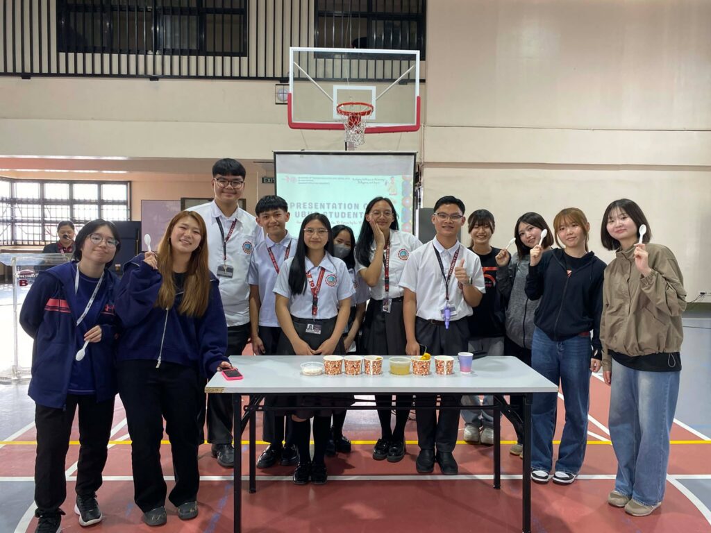 Japanese exchange students taste Filipino merienda such as bilo-bilo, gulaman, and palitaw introduced by UBHS students during the GAWIS 3 cultural exchange.