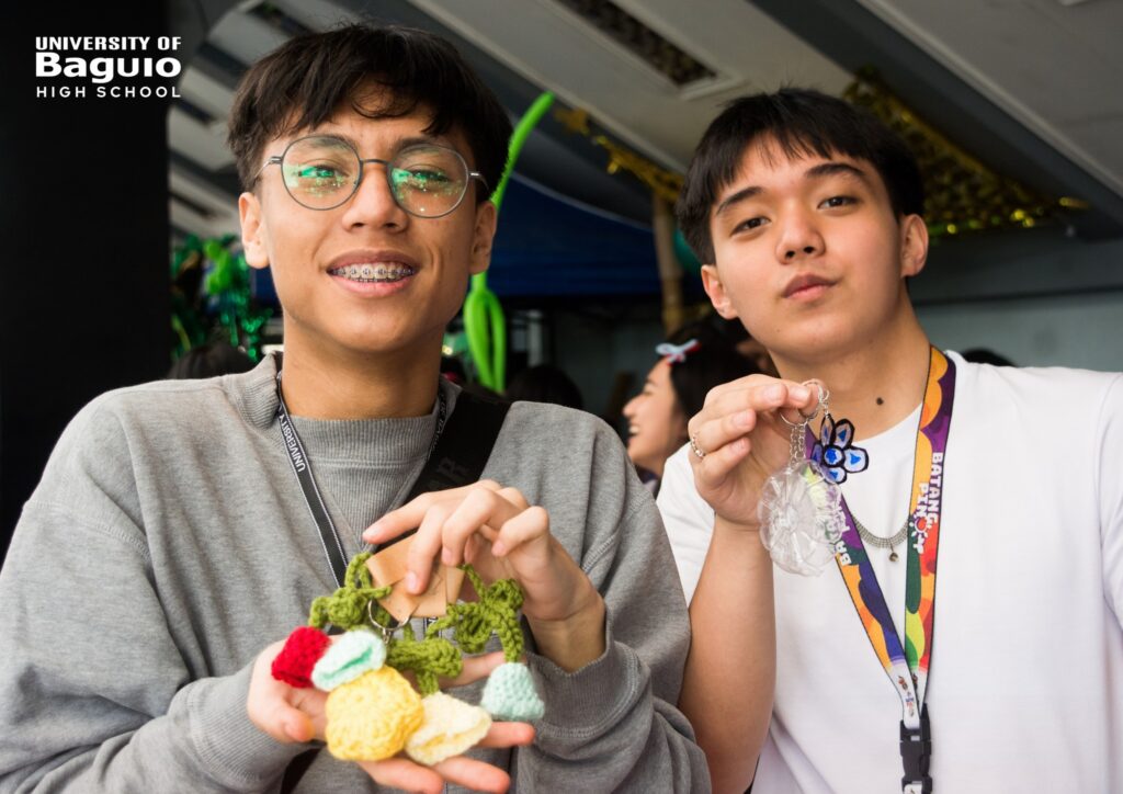 University of Baguio High School (UBHS) students present and sell their products at their booth during the High School Day 2025 celebration, demonstrating creativity, entrepreneurship, and collaboration.